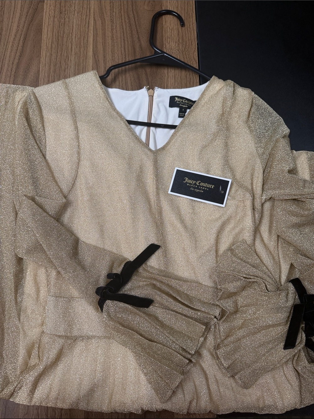 Juicy Couture Metallic Gold V-Neck Peasant Sleeve Top with Black Bow Accents